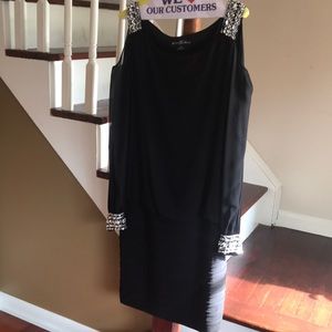 Women’s size 14 black cocktail dress.